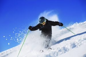 Powder snow, off piste - back country skiing. Extreme alpine skier. Beautiful nature.